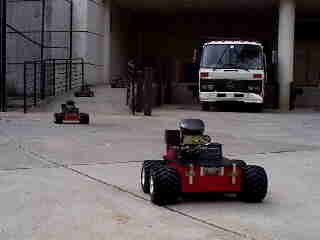 BotsMovingAwayToBldgCloser0.jpg (5519 bytes)